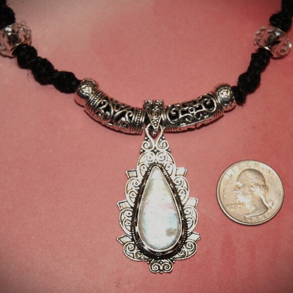 Elegant Opalescence Teardrop Cabochon on a 20" Handmade Black Hemp Necklace - Picture 6 of 7